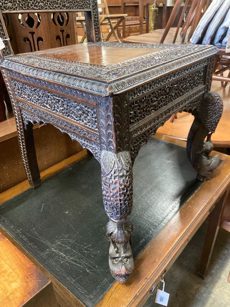 A 19th century Burmese carved hardwood side chair, width 55cm, depth 48cm, height 128cm